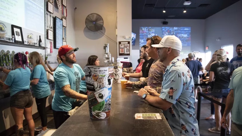 Fort Myers Brewing customers order at the bar