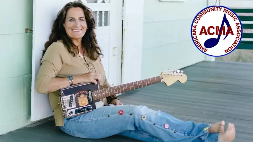 Ruth Wyand sitting on porch, ACMA logo in corner